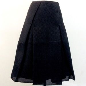 The PEOPLE’S (8) A-Lined Mesh SKIRT, Box Pleated.